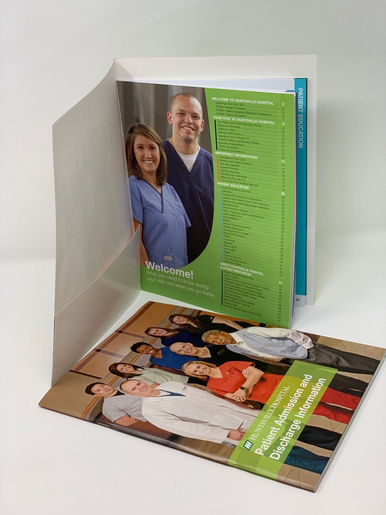 Admit and discharge folder holding patient education booklets